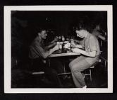 Shipboard Life. Men eating in mess hall  